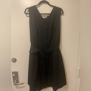 Black dress with buttons and tie. Some deodorant stains on armpits